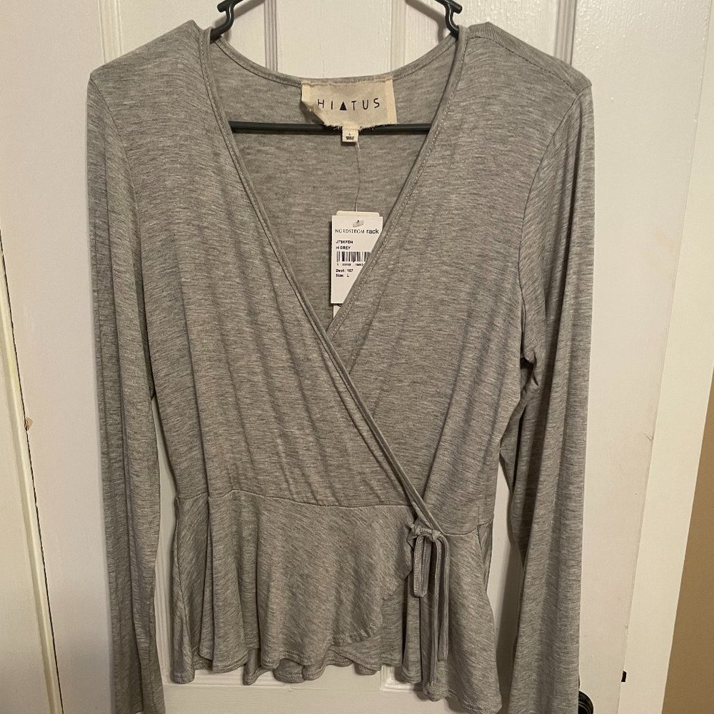 Grey blouse, larger bell like sleeves